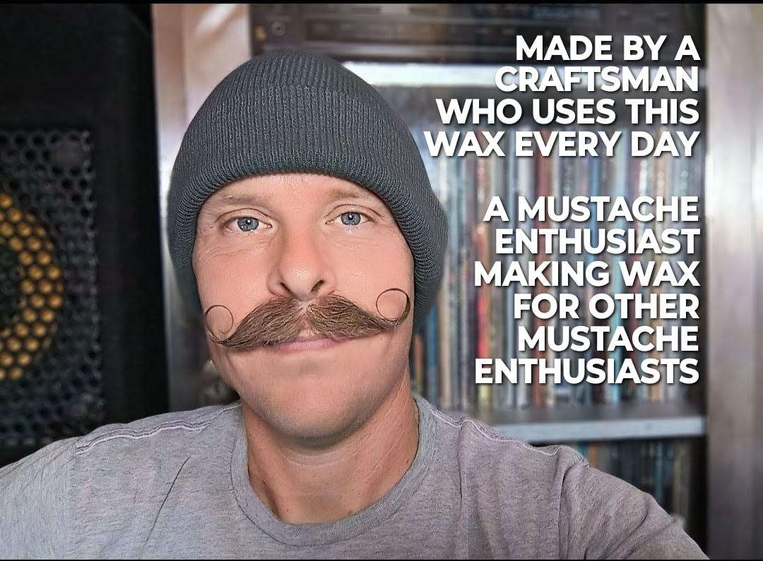 Fibonacci Mustache Wax tin in pocket illustrating portable grooming convenience