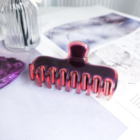 FidesAmor clip holding hair in a high ponytail for all-day comfort