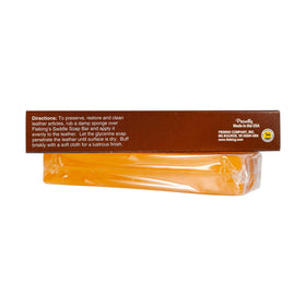 Fiebing's soap being applied to a saddle, restoring suppleness and sheen
