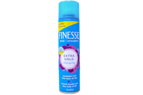 Finesse nozzle close-up demonstrating fine mist for even application benefit