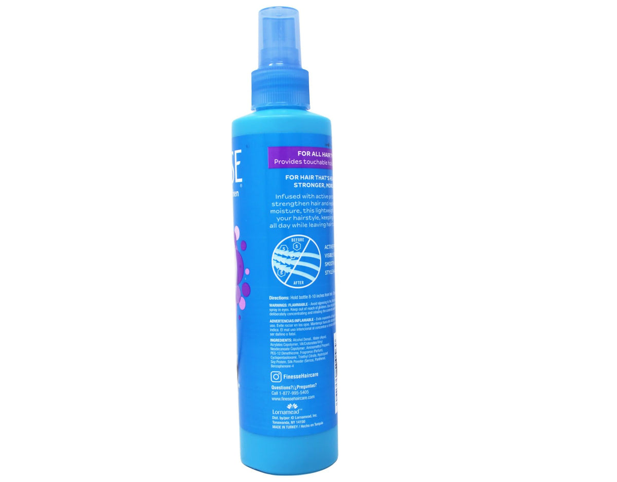 FINESSE hairspray used in salon setting for long-lasting style
