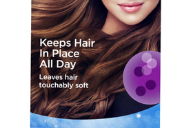 Finesse spray mist on styled hair showing lightweight finish and frizz control