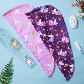 FIOBEE towel next to ruler showing 24x9.4 inch size for most heads