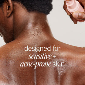 First Aid Beauty mist on skin texture showing quick-drying, non-sticky finish