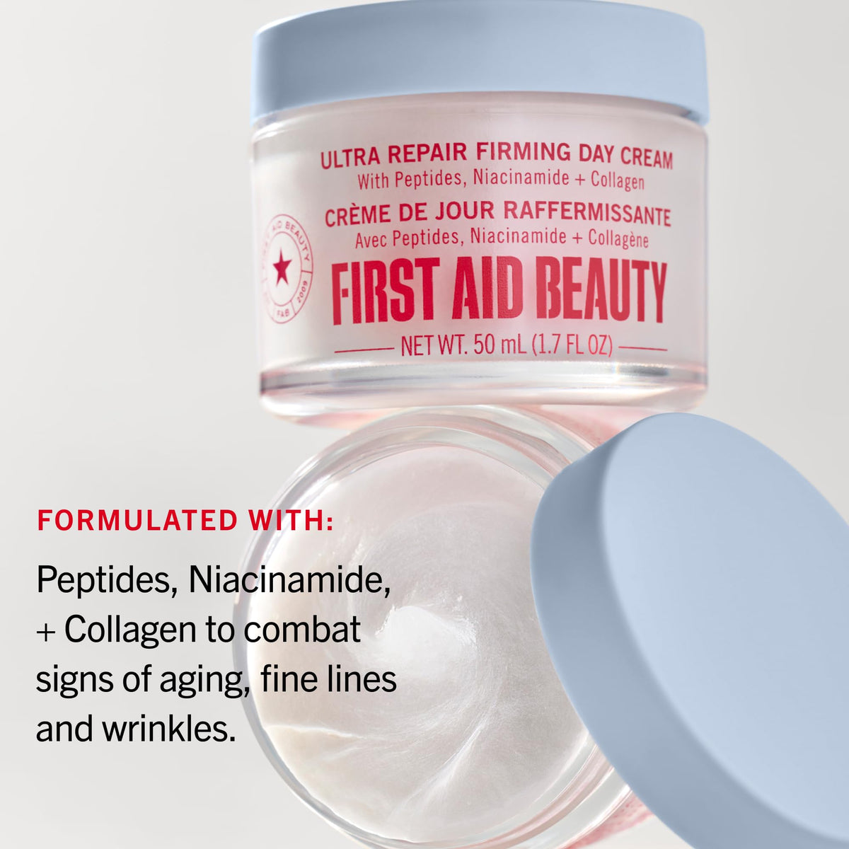 First Aid Beauty cream on fingers demonstrating lightweight spreadability
