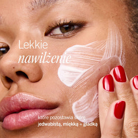 First Aid Beauty applying moisturizer on hand for lightweight hydration