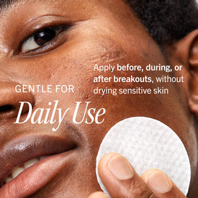 First Aid Beauty pads next to ruler showing compact, travel-friendly size