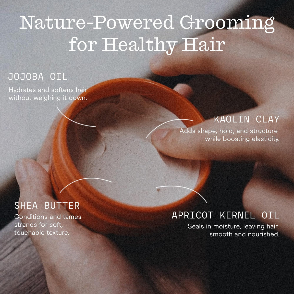 Firsthand applying paste to longer hair demonstrating added texture
