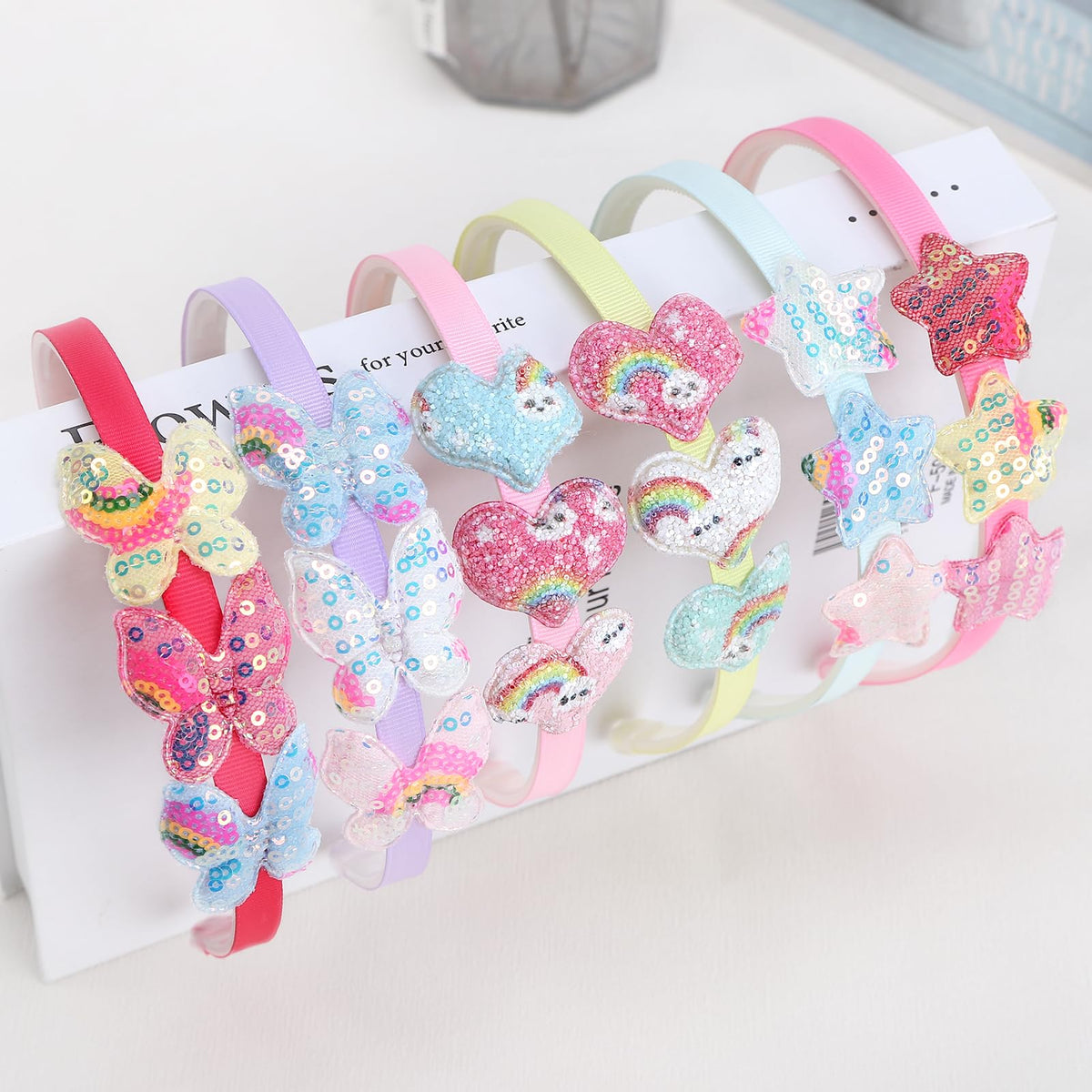 Fishdown on child wearing a headband showing comfortable fit and playful style