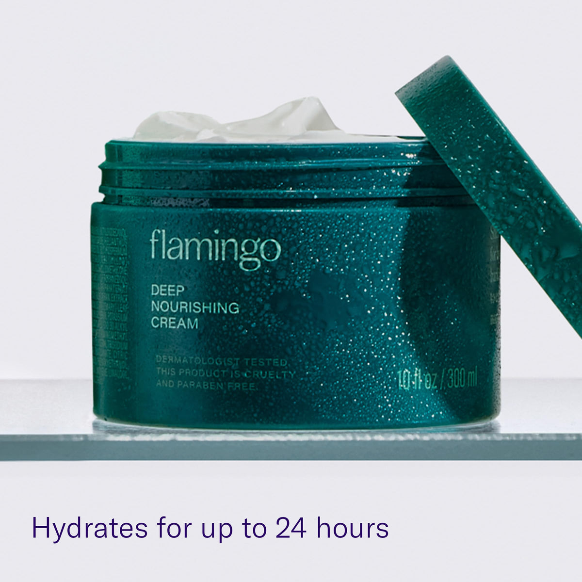 Flamingo applying cream to elbow for softened rough skin benefit