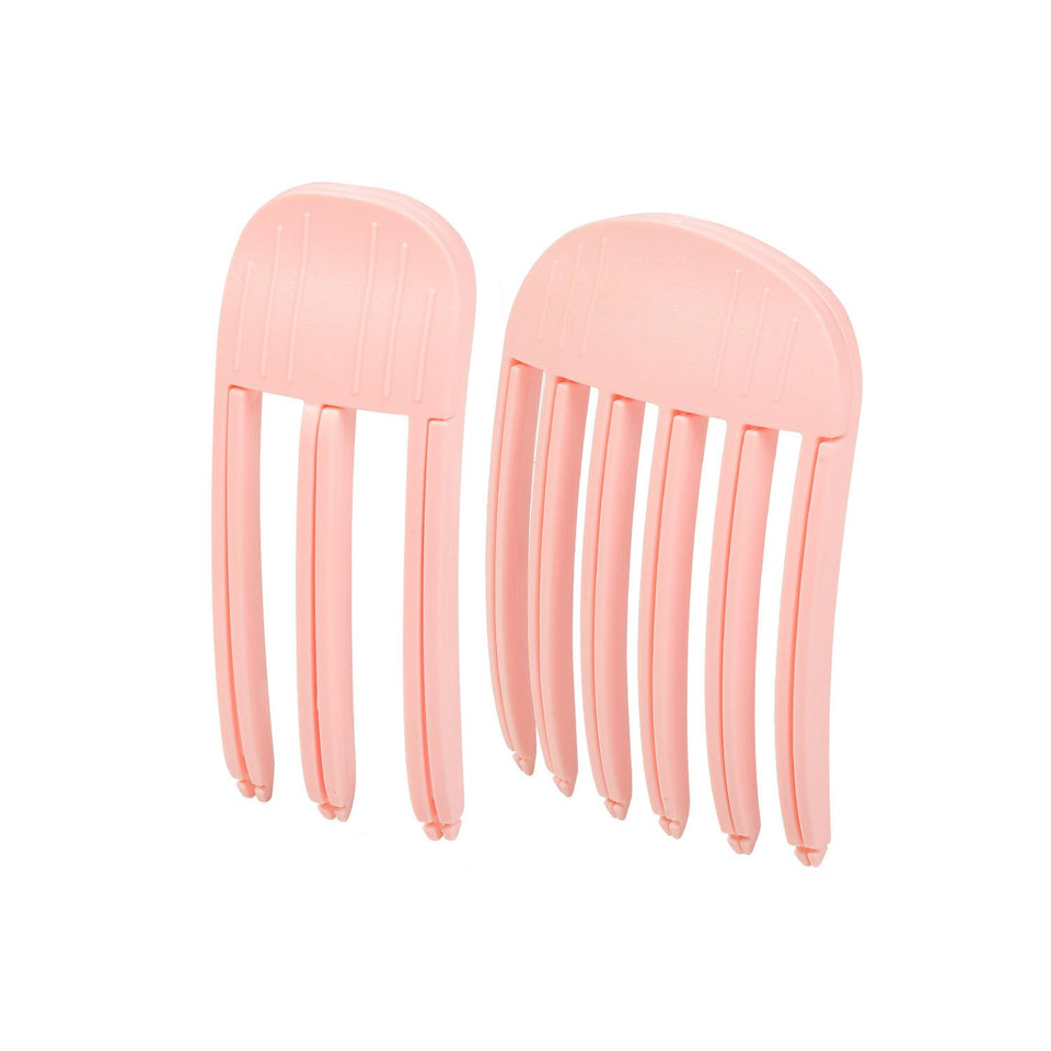 FlaSloth front view root clips in orange and pink showing compact design and immediate volume