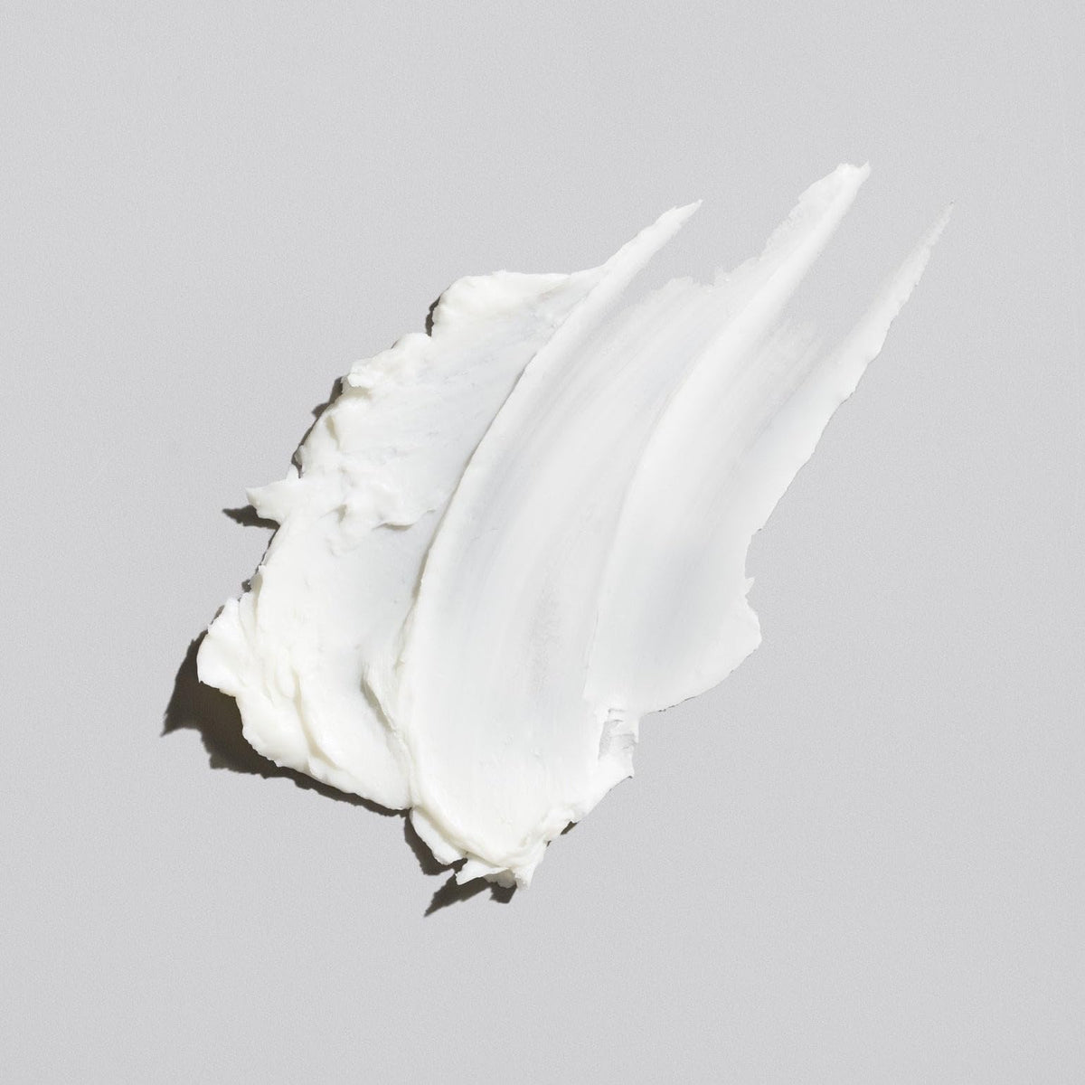 Flow Bros applying clay in hands, smooth application and control