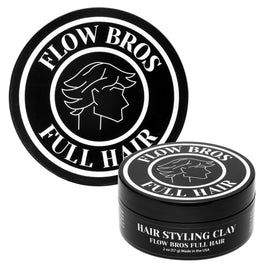 Flow Bros clay on bathroom shelf with grooming tools, daily routine ready