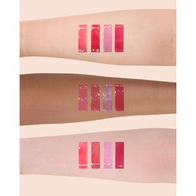 Flower Knows swatch on skin showing raspberry shimmer and buildable color payoff