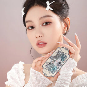 Flower Knows matte shades blended on skin to show buildable, even color