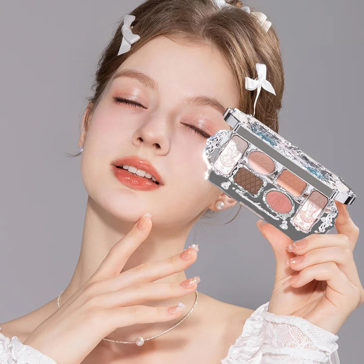 Flower Knows shimmer shade swatched to show luminous payoff and glow