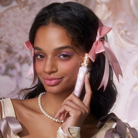 Flower Knows vanity display styled shot highlighting decorative perfume-inspired bottle