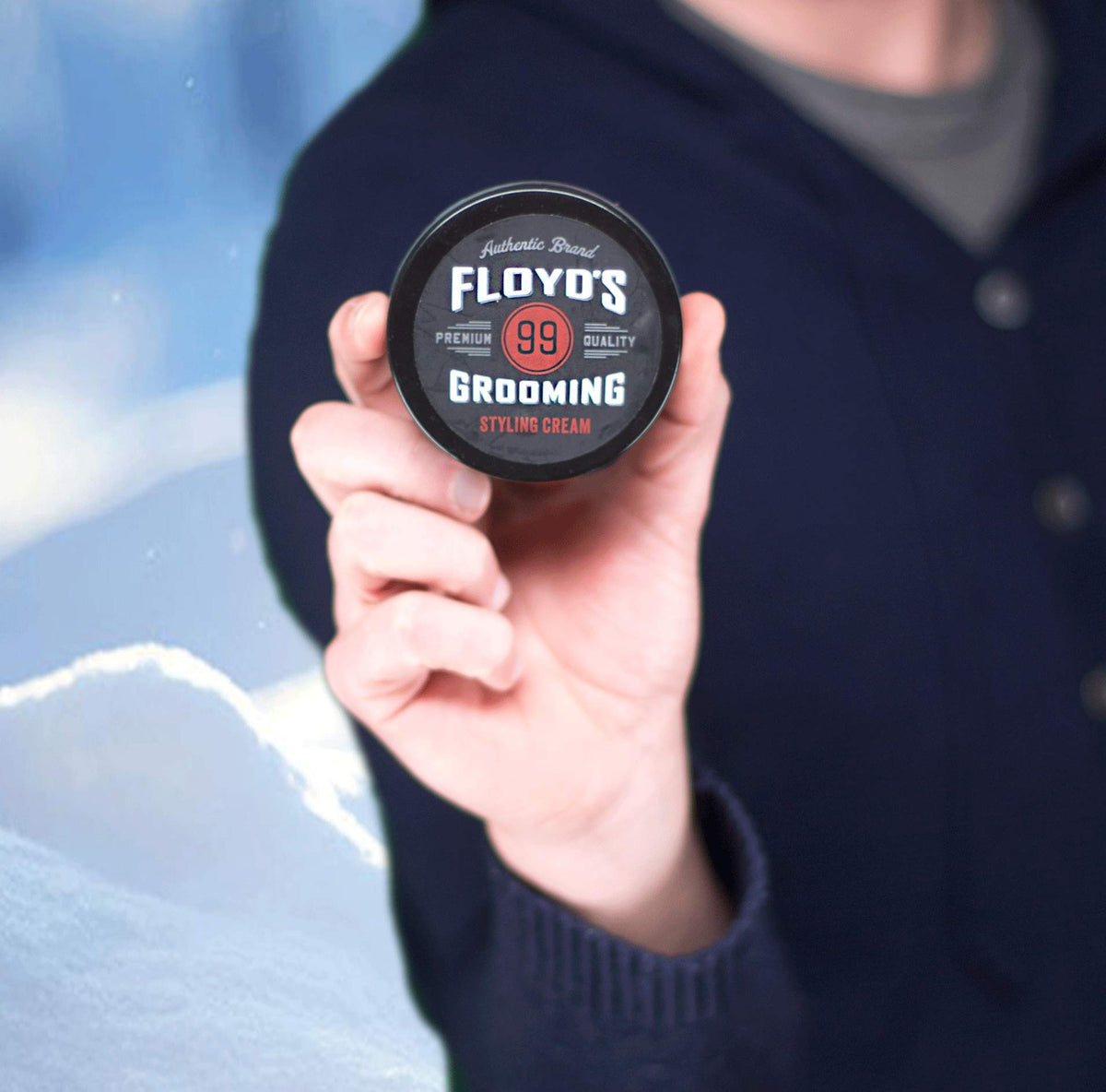 Floyd's 99 being applied to hair showing natural hold and frizz reduction
