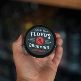 Floyd's 99 next to a coin size comparison showing compact travel-friendly size