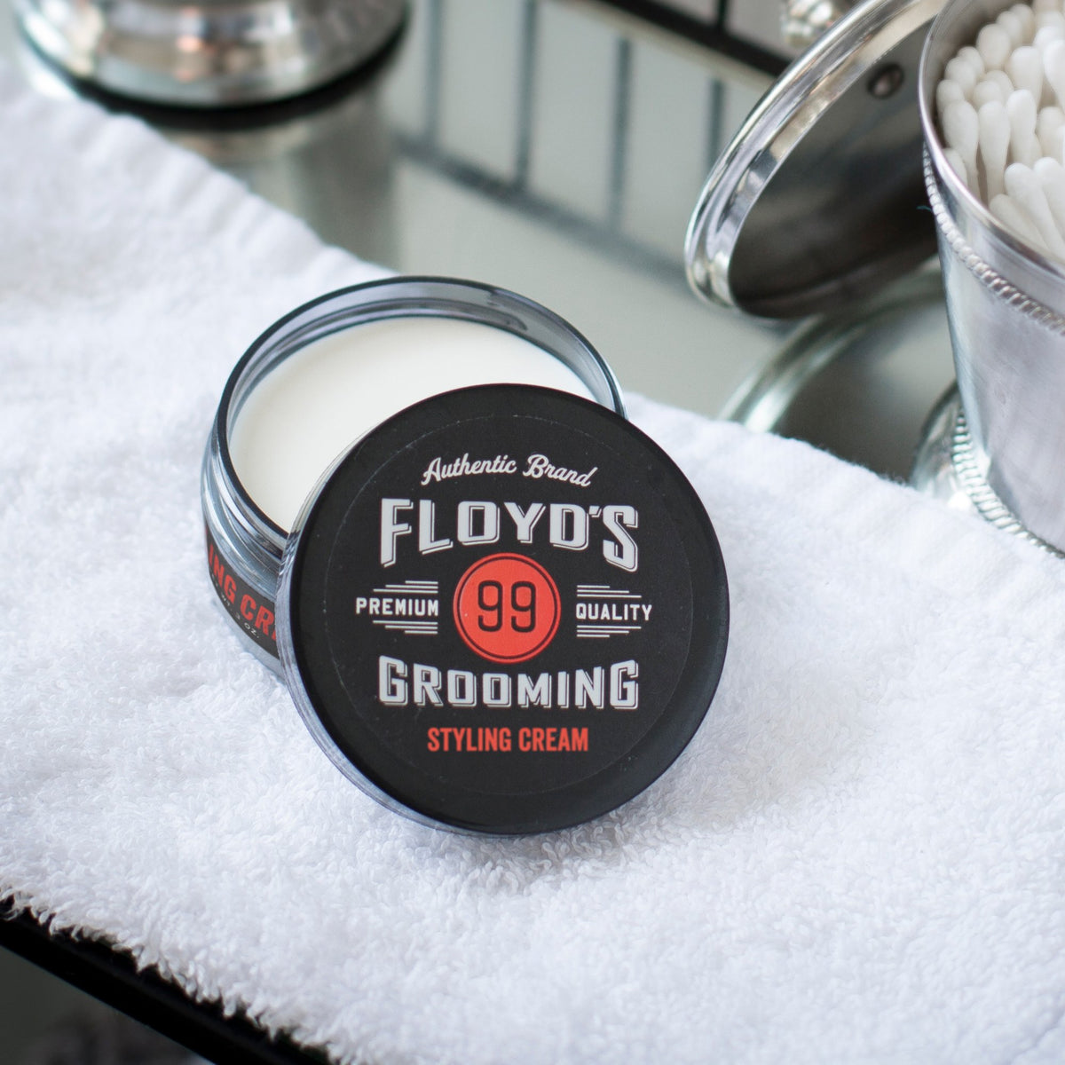 Floyd's 99 cream texture close-up highlighting smooth consistency and spreadability