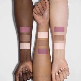 FOCALLURE lifestyle shot applying palette near mirror for quick everyday glow