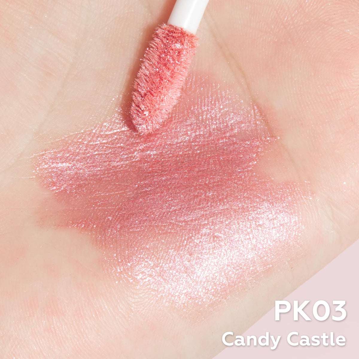 FOCALLURE PK03 swatch on model lips demonstrating vibrant metallic payoff and longwear