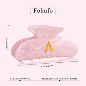 Fohufo clip next to coin size comparison shows compact strength and fit