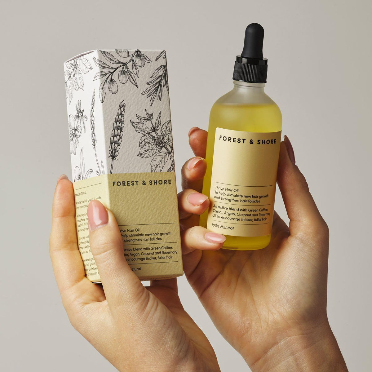 Forest & Shore bottle in hand showing product size and portability