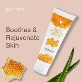 Applying Forever Living cream on skin demonstrating soothing, hydrating effect