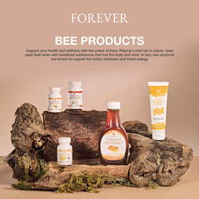 Forever Living jar on a vanity with towel showing botanical skincare appeal