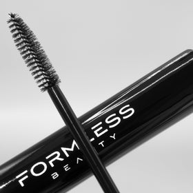 Formless Beauty product in hand during application, shows easy use and quick results
