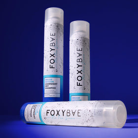 FoxyBae bottle in travel bag illustrating on-the-go convenience