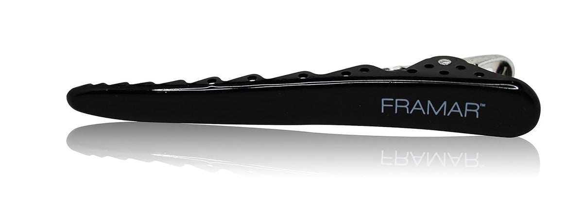 FRAMAR clip securing foil during coloring for precise application