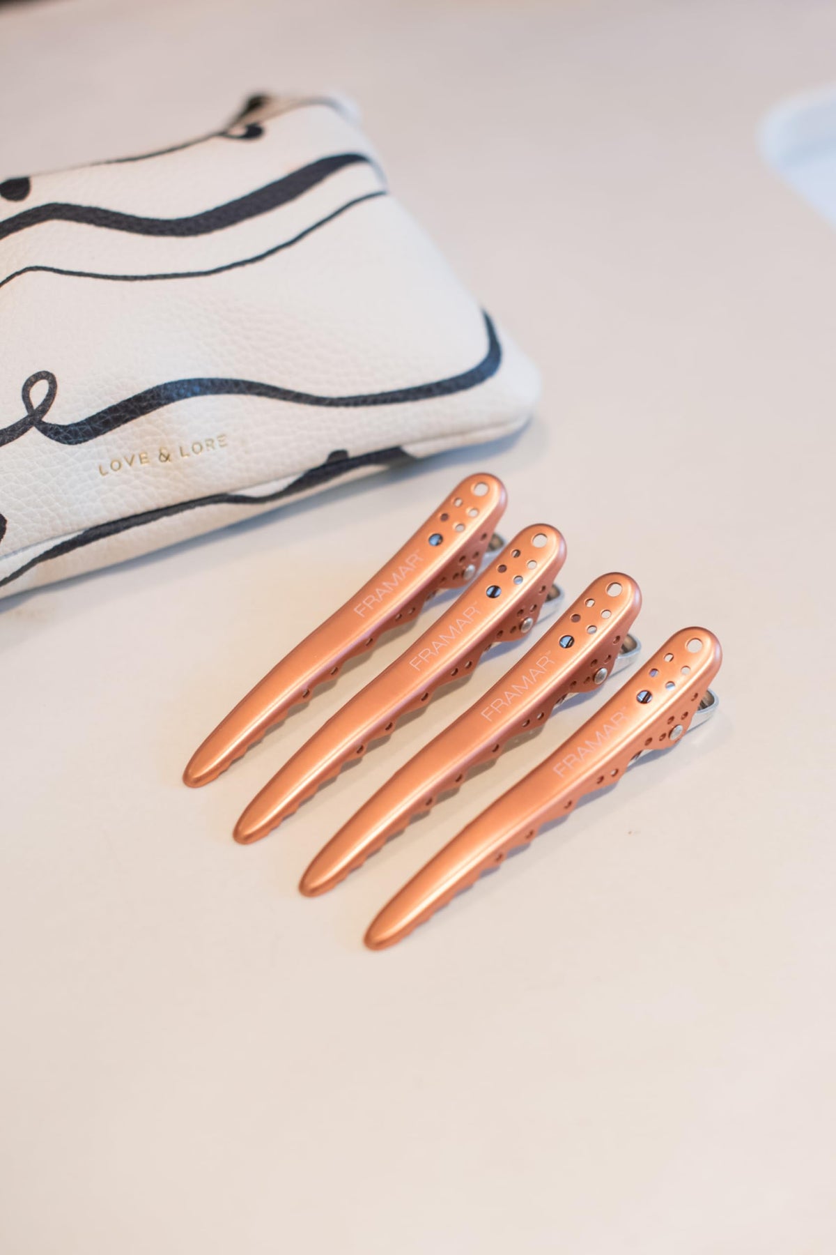 FRAMAR clips on model side profile providing contour fit and stability