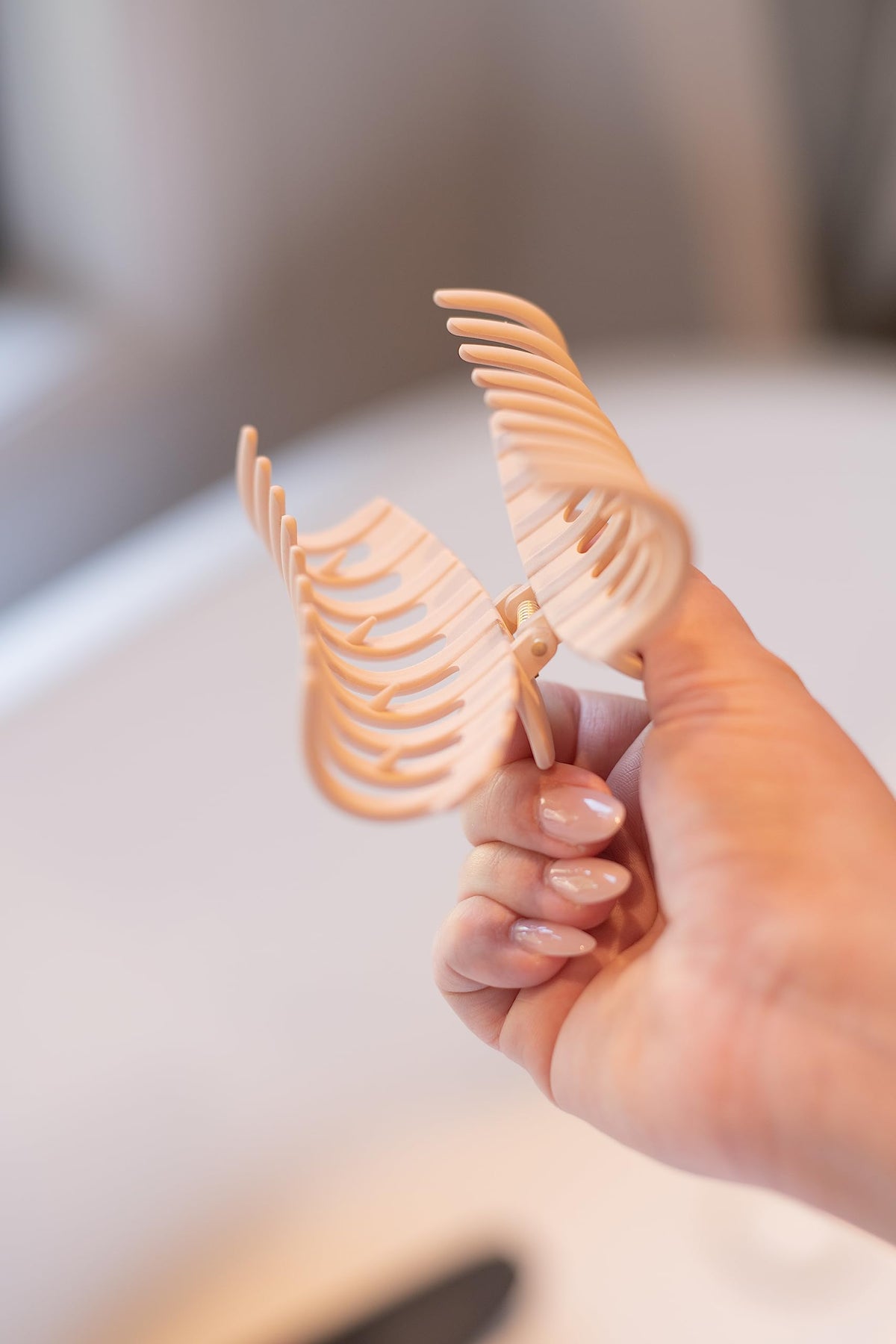 FRAMAR clip dropped onto surface showing durability and resilient build