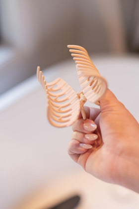 FRAMAR clip dropped onto surface showing durability and resilient build