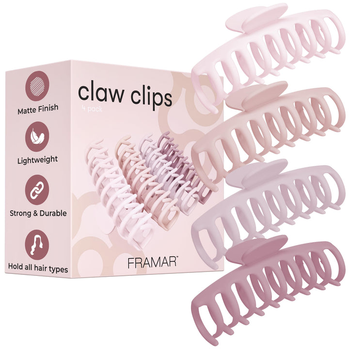 FRAMAR front view of four large pink claw clips, shows set styling benefit