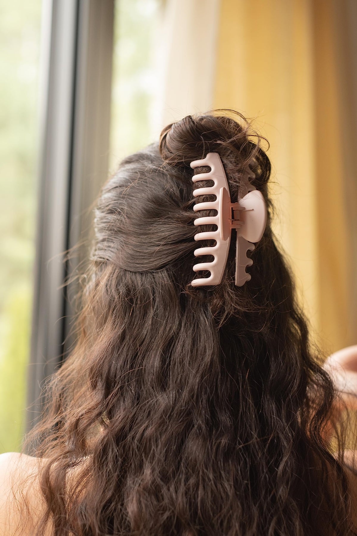 FRAMAR clips on a vanity with accessories, shows styling versatility