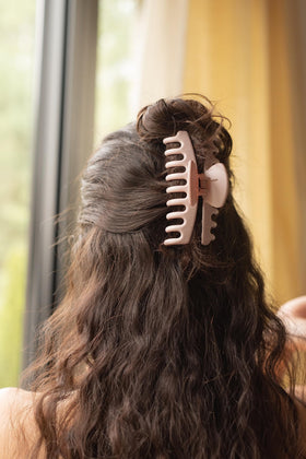 FRAMAR clips on a vanity with accessories, shows styling versatility