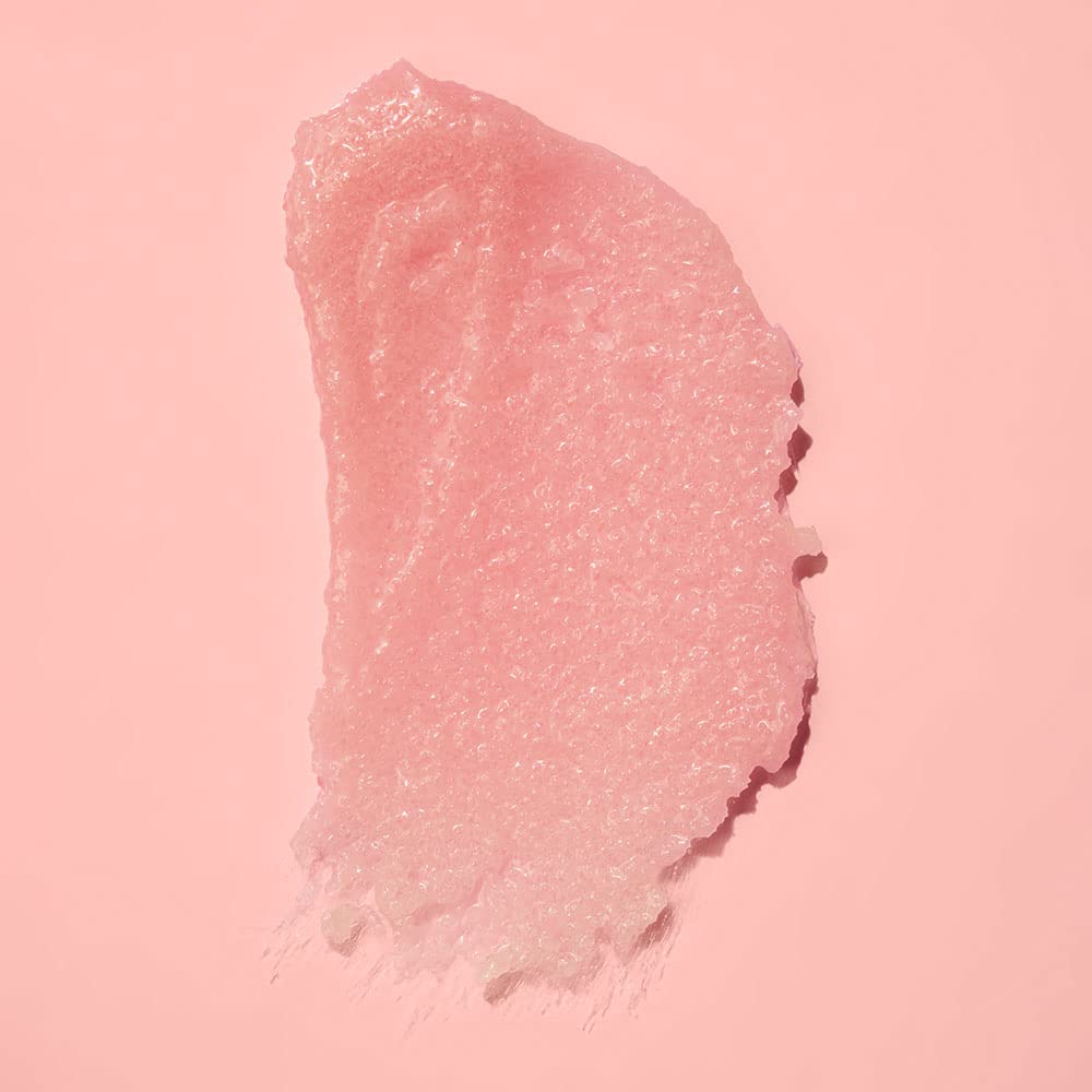 frank body scoop in hand demonstrating creamy scrub and easy use