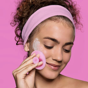Freeman person applying a peel-off mask demonstrating easy at-home use