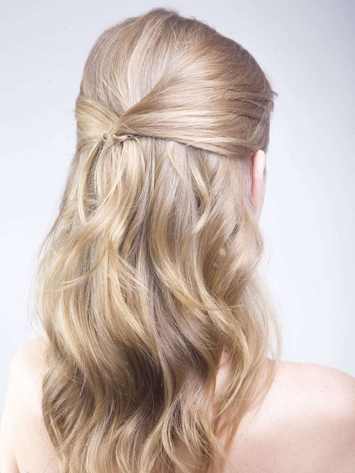 Frenchies used in bridal updo showing professional finish benefit