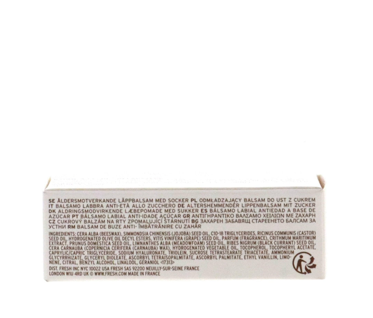 Fresh sugar lip treatment ingredient origins display with botanicals showing natural antioxidant benefit
