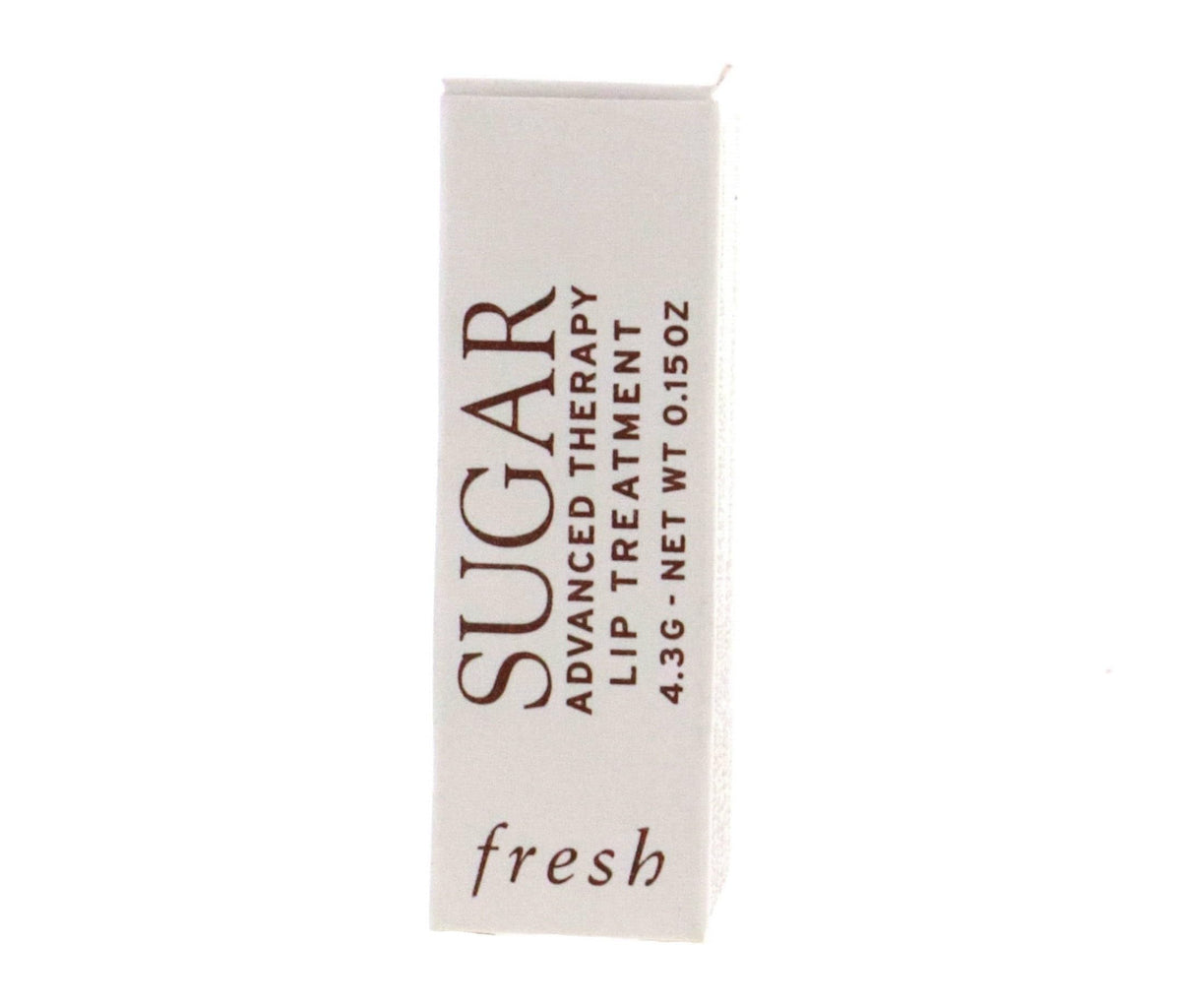 Fresh sugar lip treatment product in hand for scale demonstrating compact travel-friendly benefit