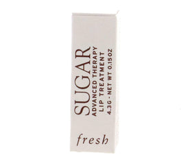 Fresh sugar lip treatment product in hand for scale demonstrating compact travel-friendly benefit