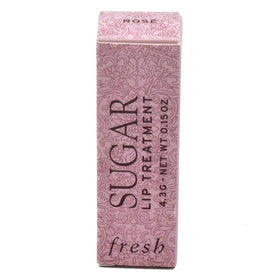 Fresh sugar lip treatment in a handbag lifestyle shot showing on-the-go hydration benefit