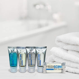 Freshscent tube styled in hotel bathroom conveying upscale look and guest-ready amenity