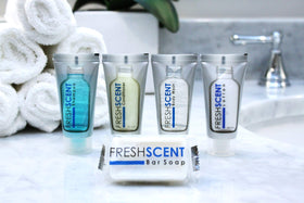 Freshscent tube in hand for scale showing travel size convenience and portability