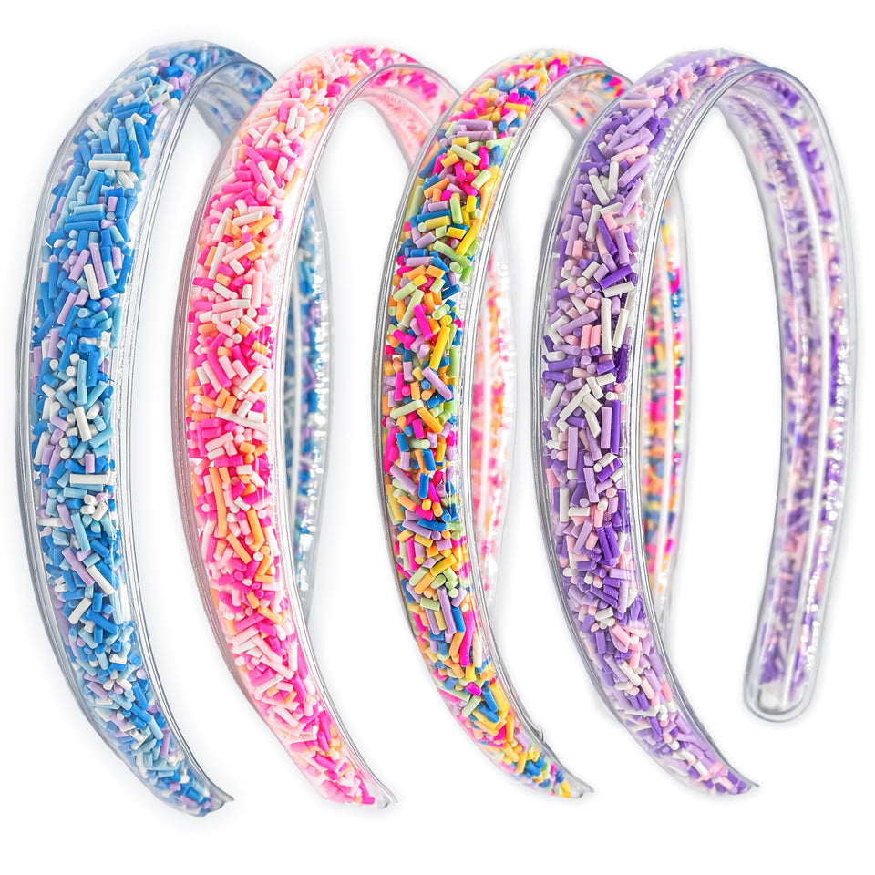 FROG SAC four headbands flat lay showing colors and sparkles for outfit matching
