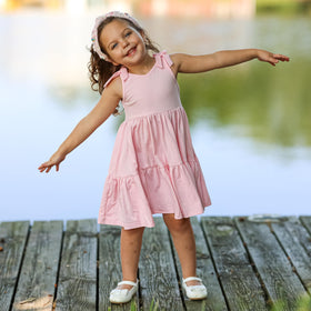 FROG SAC grouped with kids accessories showing versatile outfit pairing